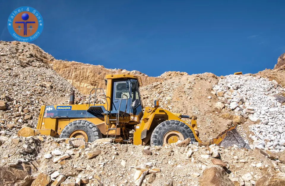 A yellow heavy loader working on mining